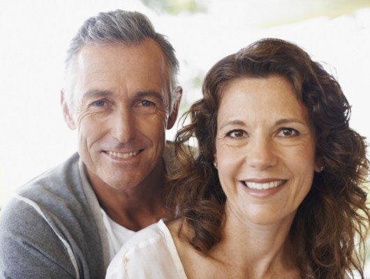 Smiling older man and woman