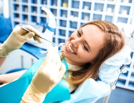 Young woman smiling at dental checkup