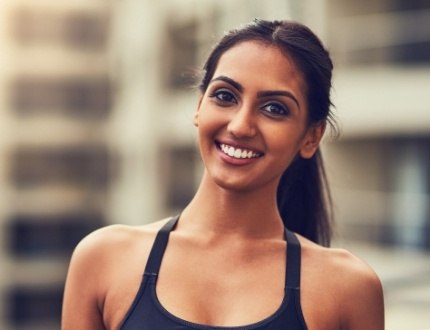 Smiling woman with ponytail