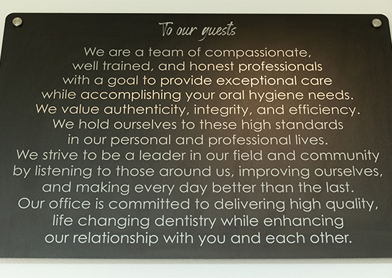 Prime Dentistry mission statement sign on wall