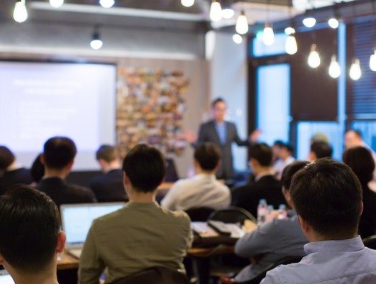 Group of people attending a lecture