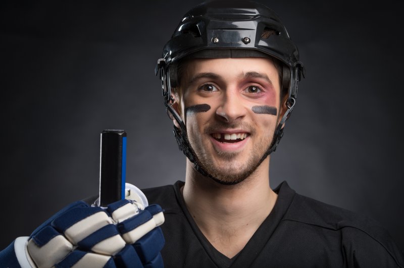Hockey player missing tooth
