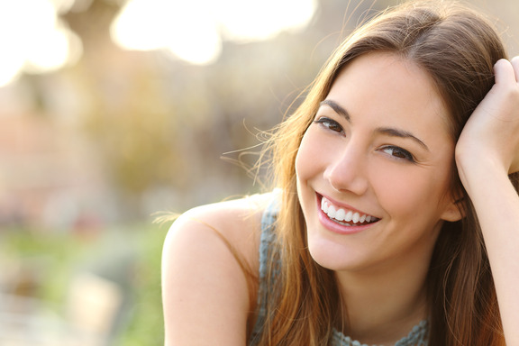 closeup of young woman smiling