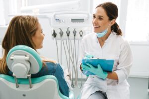 Dentist listening attentively to patient